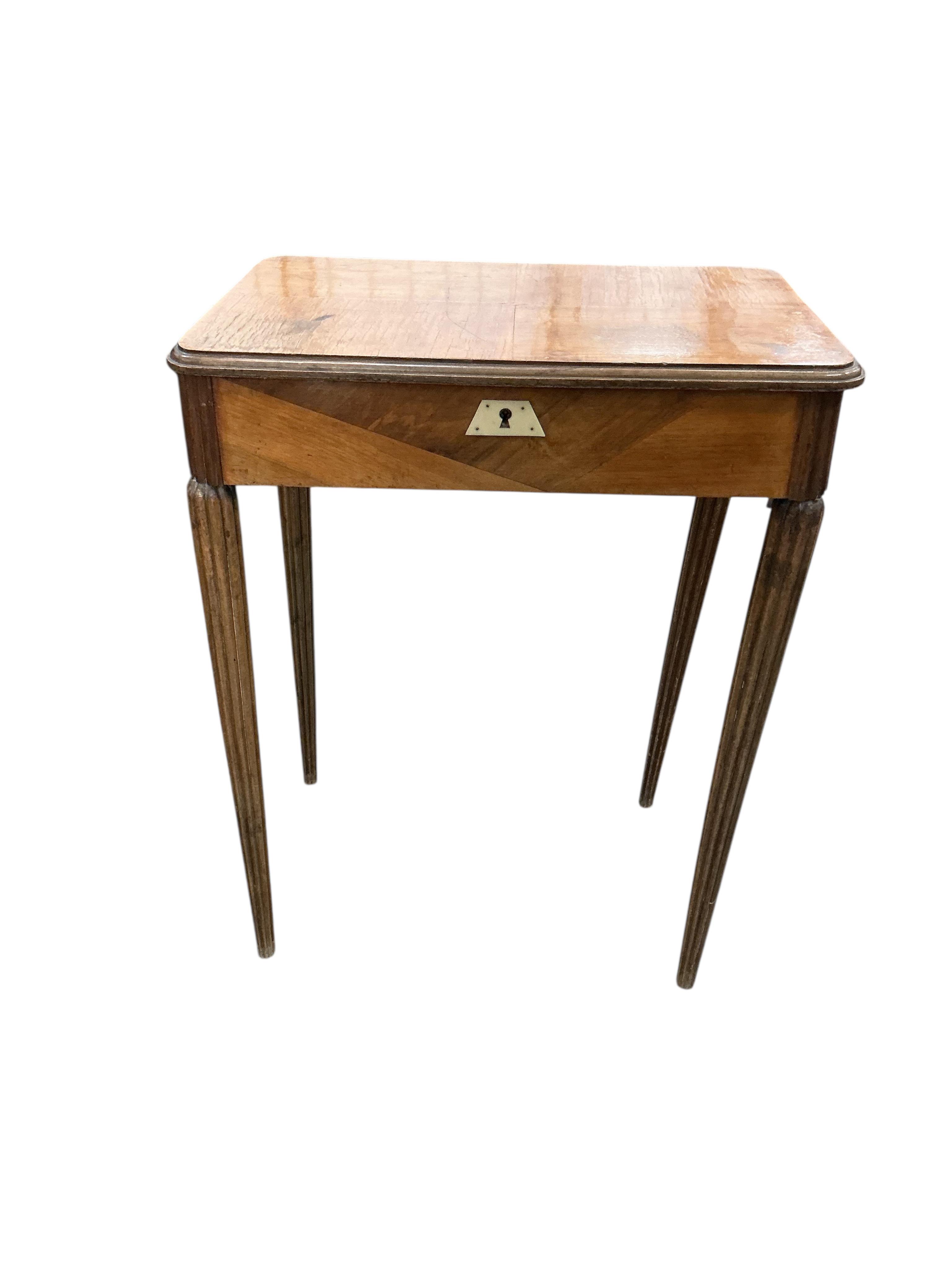 An early 20th century Continental mahogany enclosed dressing table in need of restoration, width 60cm, depth 40cm, height 74cm